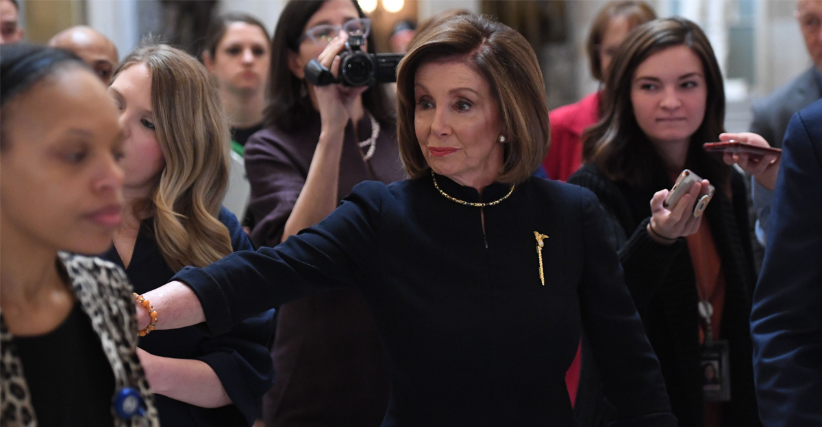 Speaker of the House Nancy Pelosi walks to the House floor at the US Capitol, while the House readies for a historic vote on December 18, 2019 in Washington, DC.