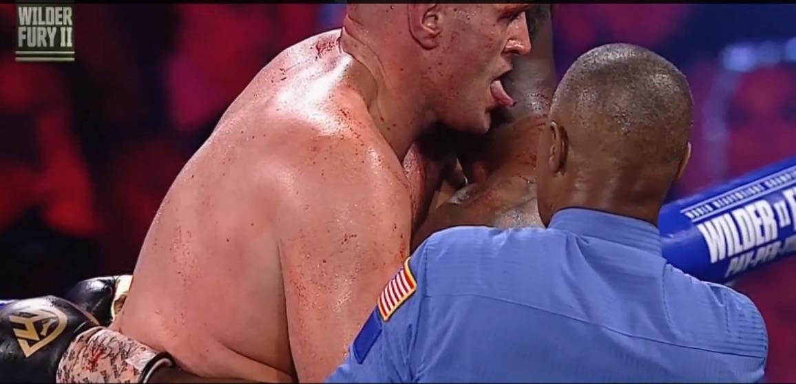 Tyson Fury Dominates, Wins by TKO in 7th Round After Appearing to Lick Blood Off Deontay Wilder's Body