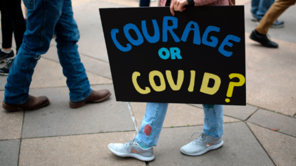Covid Mark Felix/Getty Images