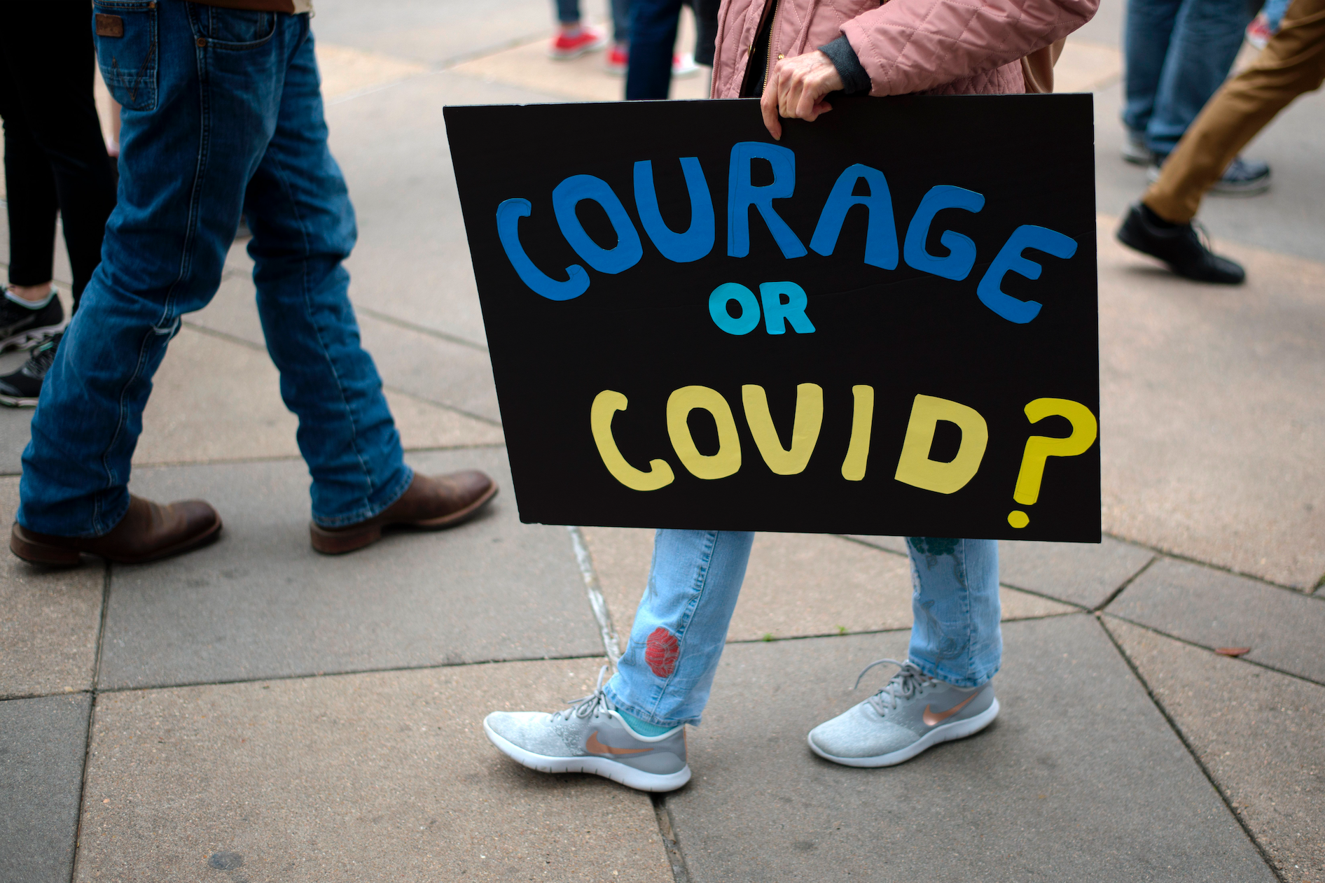 Covid Mark Felix/Getty Images