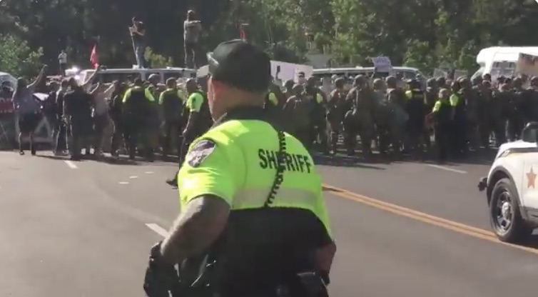 Protestors Block Access to Mt. Rushmore by Parking Disabled Vans Across Road