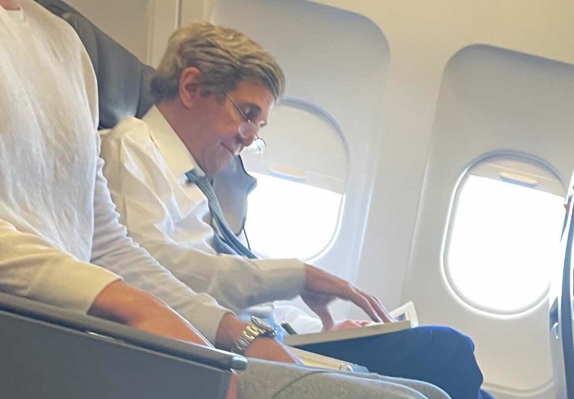 john kerry mask plane