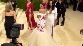 AOC Wears 'Tax the Rich' Dress at Met Gala