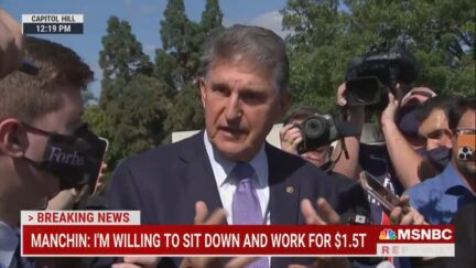 Joe Manchin addresses reporters outside Capitol