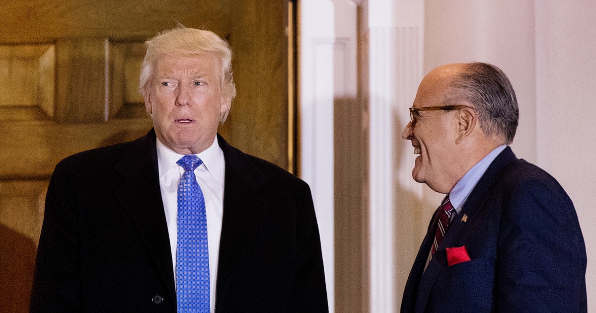 BEDMINSTER TOWNSHIP, NJ - NOVEMBER 20: (L to R) President-elect Donald Trump and former New York City mayor Rudy Giuliani exit the clubhouse following their meeting at Trump International Golf Club, November 20, 2016 in Bedminster Township, New Jersey. Trump and his transition team are in the process of filling cabinet and other high level positions for the new administration.