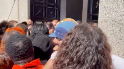 Climate and indigenous peoples activists attempt to storm Interior Department on Oct. 15