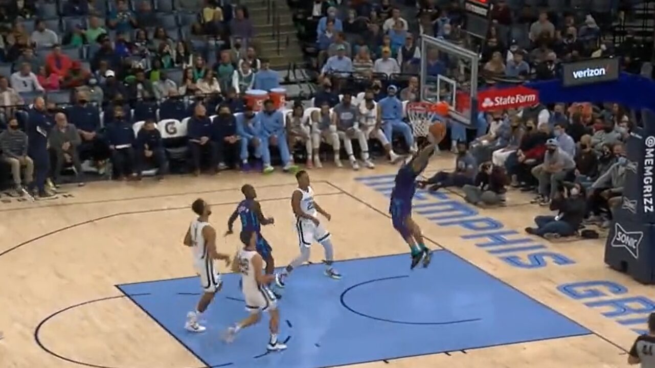 Eric Collins goes wild over Miles Bridges dunk