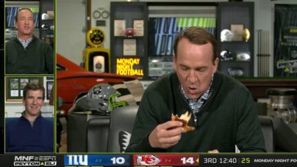 Peyton Manning destroys a piece of chicken on Monday Night Football