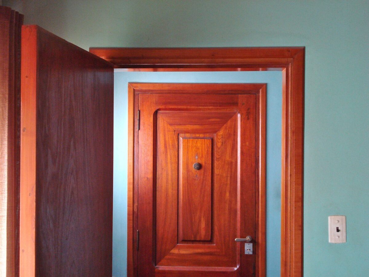 wood door doorway doorknob knob