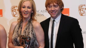 British author JK Rowling (2nd R) andRupert Grint (R) after receiving their British Academy of Film Award (BAFTA)