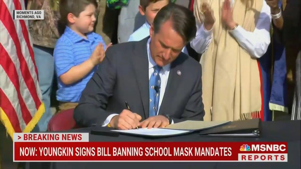 Virginia Governor Glenn Youngkin signs the school mask ban into law on February 16