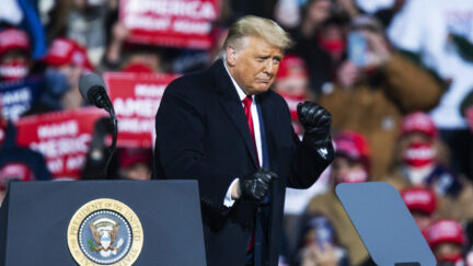 MONTOURSVILLE, PA - OCTOBER 31: U.S. President Donald Trump dances after speaking to supporters during a rally on October 31, 2020 in Montoursville, Pennsylvania. Donald Trump is crossing the crucial state of Pennsylvania in the last few days of campaigning before Americans go to the polls on November 3rd to vote. Trump is currently trailing his opponent Joe Biden in most national polls. (Photo by Eduardo Munoz Alvarez/Getty Images)