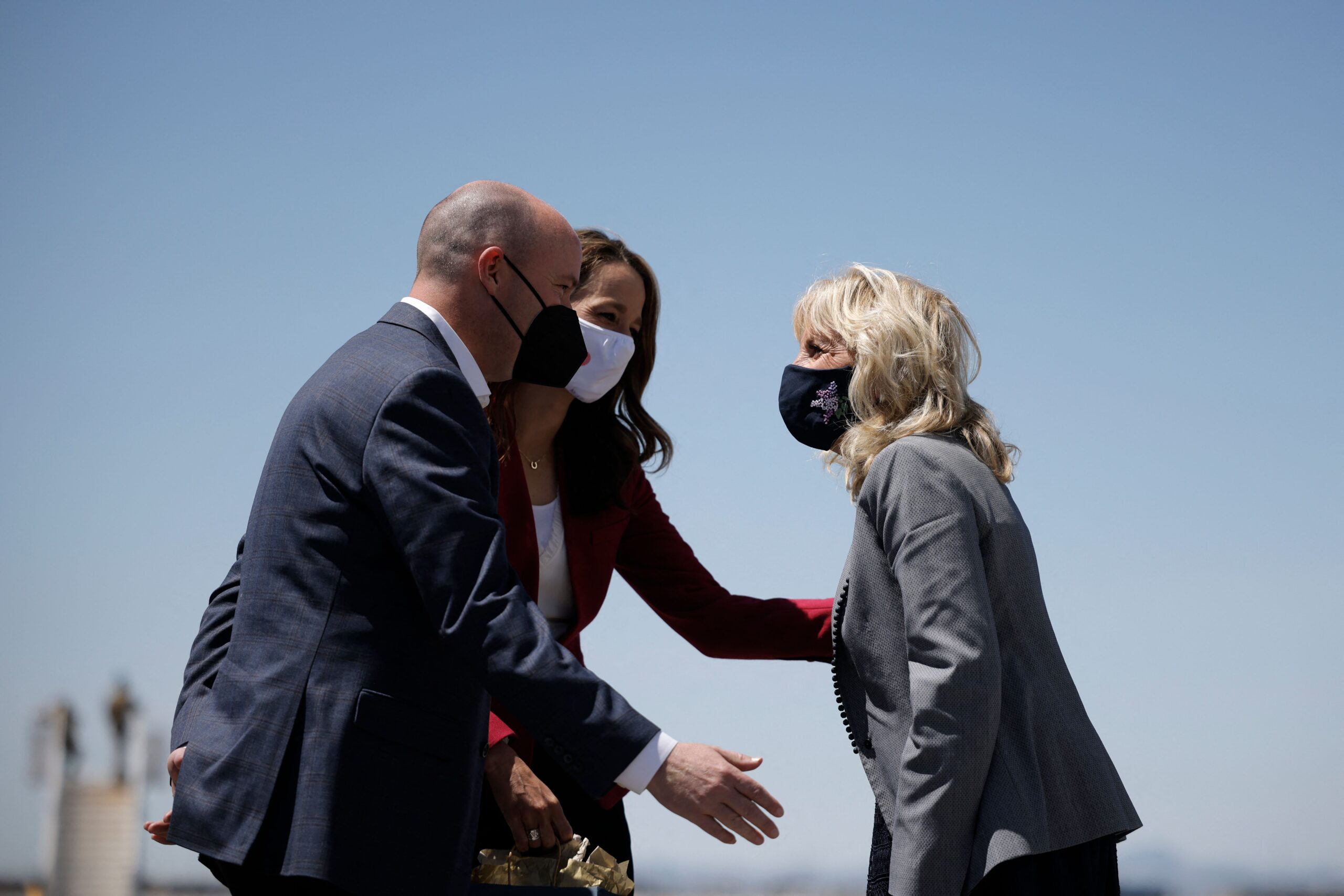 Spencer Cox and his wife greet Jill Biden