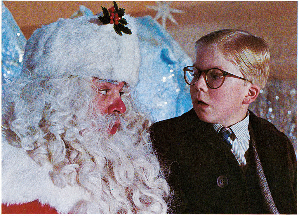 promotional photo from A Christmas Story showing Peter Billingsley with Santa
