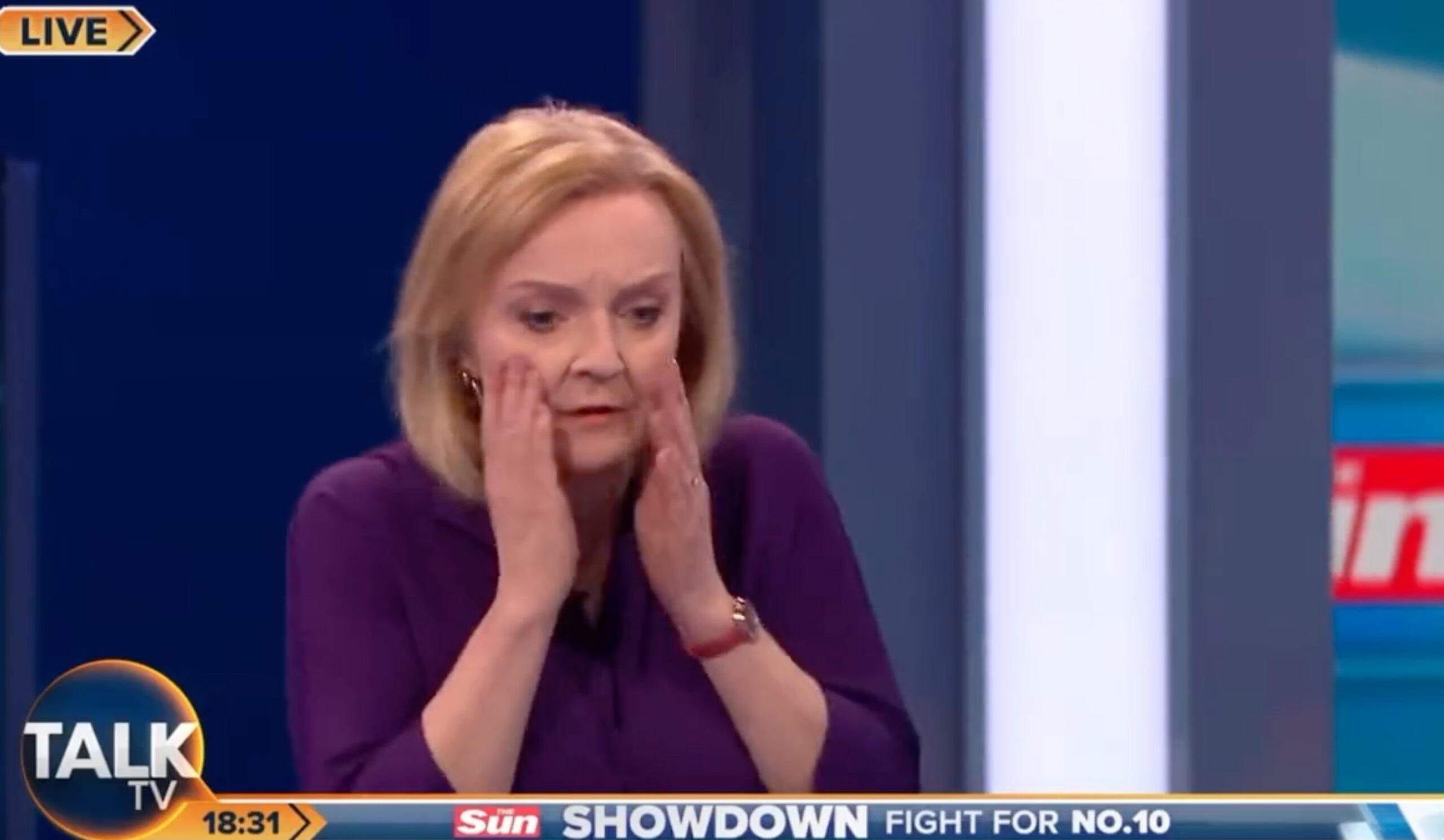 Liz Truss reacts to crash during debate on July 26