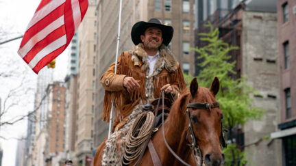 Otero County Commission Chairman and Cowboys for Trump co-founder Couy Griffin rides his horse on 5th avenue