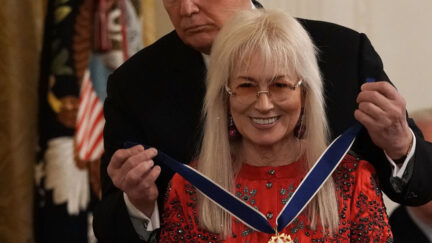 Miriam Adelson getting Presidential Medal of Freedom from President Donald Trump