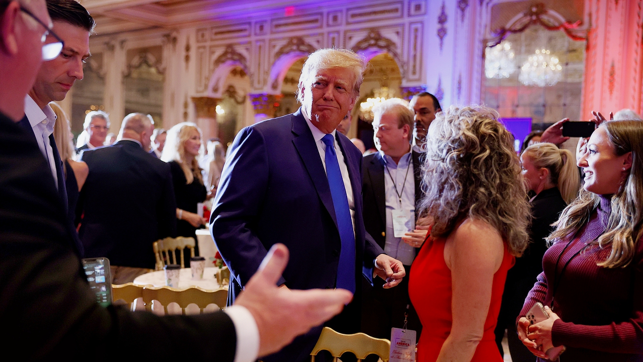 PALM BEACH, FLORIDA - NOVEMBER 08: Former U.S. President Donald Trump mingles with supporters during an election night event at Mar-a-Lago on November 08, 2022 in Palm Beach, Florida. Trump addressed his supporters as the nation awaits the results of the midterm elections. 