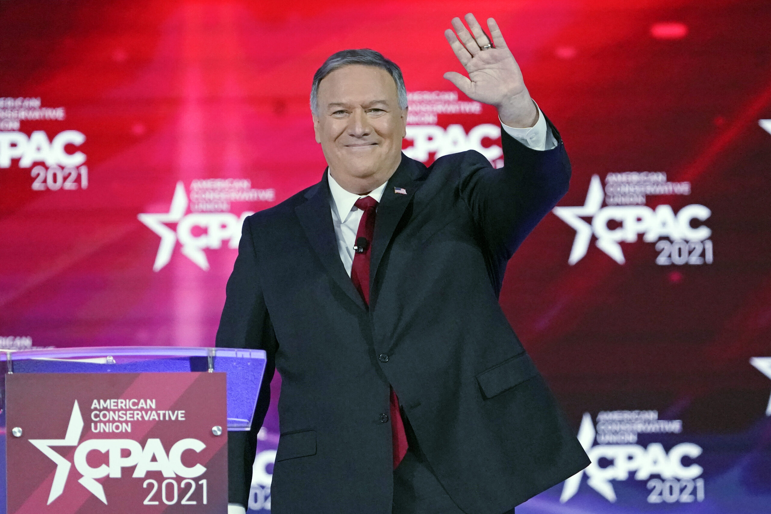 FILE - In this Feb. 27, 2021 file photo, former Secretary of State Mike Pompeo waves as he is introduced at the Conservative Political Action Conference in Orlando, Fla. Pompeo has become the latest former Trump administration official to launch a political action committee. (AP Photo/John Raoux, File)