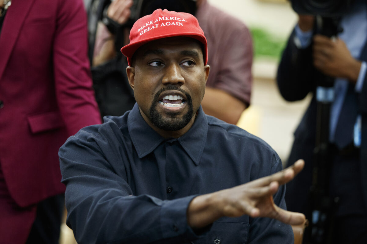 Kanye West wearing MAGA hat