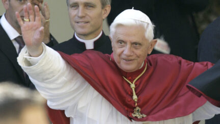 FILE - Pope Benedict XVI greets the faithful in front of the Old Chapell in Regensburg, southern Germany, Sept. 13, 2006.
