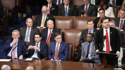 Rep. Kevin McCarthy, R-Calif., right, listens as Rep. Matt Gaetz, R-Fla., nominates Rep. Jim Jordan, R-Ohio, for Speaker of the House.