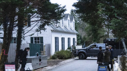The access road to President Joe Biden's home in Wilmington, Del., is seen from the media van on Jan. 13, 2023. The Justice Department has searched Biden’s home in Delaware and located six documents containing classification markings and also took possession of some of his notes, the president’s lawyer said Saturday, Jan. 21.