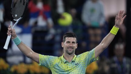 Serbia's Novak Djokovic celebrates after he beats Poland's Hubert Hurkacz during their quarter final match of the Dubai Duty Free Tennis Championships in Dubai, United Arab Emirates, Thursday, March 1, 2023. (AP Photo/Kamran Jebreili)
