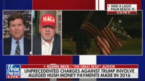 Glenn Beck wearing a MAGA hat