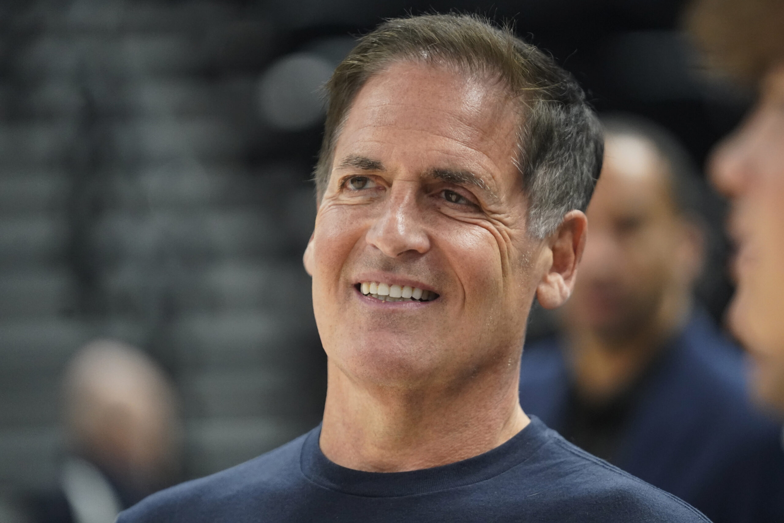 Mark Cuban, owner of the Dallas Mavericks, watches warm ups before Game 6 of an NBA basketball first-round playoff series against the Utah Jazz, Thursday, April 28, 2022, in Salt Lake City.