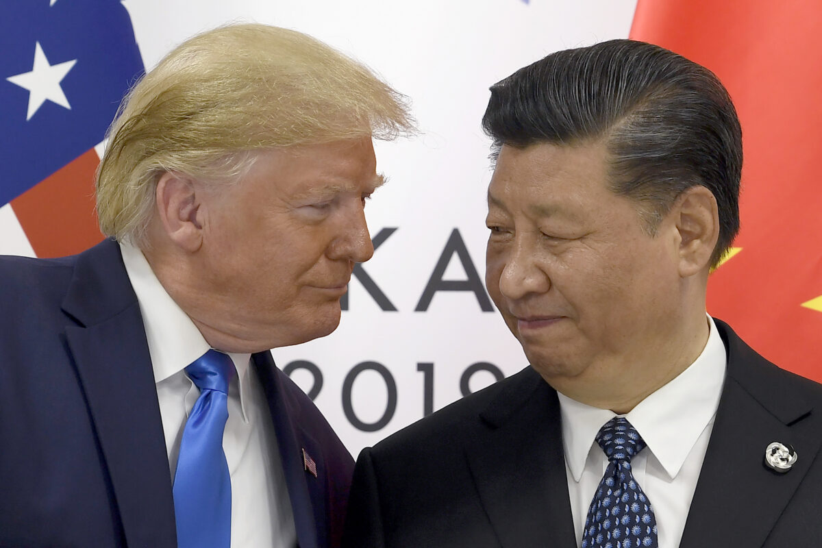 President Donald Trump, left, meets with Chinese President Xi Jinping during a meeting on the sidelines of the G-20 summit in Osaka, Japan, Saturday, June 29, 2019.