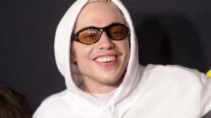 Pete Davidson wearing a hoodie and sunglasses