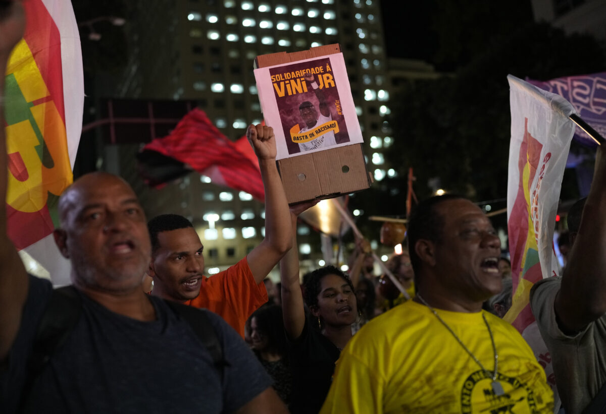 Brazilian soccer fans attend a protest against the racist abuse of soccer star Vini Jr.