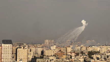 A phosphorus missile fired by Israeli aircraft over the sky of Gaza City Israel said it recaptured Gaza border areas from Hamas as the war's death toll passed 3,000 on October 10, the fourth day of gruelling fighting since the Islamists launched a surprise attack.