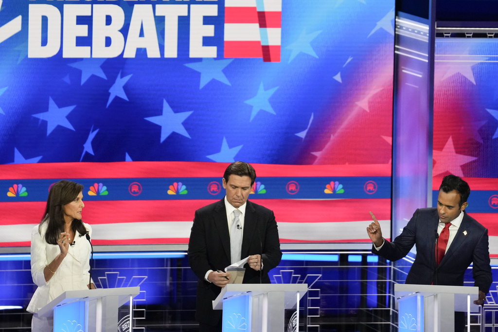 Republican presidential candidates from left, former UN Ambassador Nikki Haley, Florida Gov. Ron DeSantis, and businessman Vivek Ramaswamy, participate in a Republican presidential primary debate hosted by NBC News Wednesday, Nov. 8, 2023, at the Adrienne Arsht Center for the Performing Arts of Miami-Dade County in Miami.