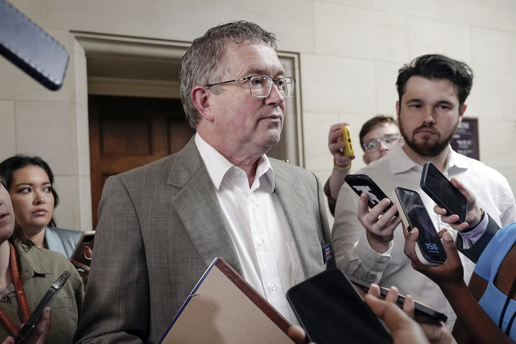 Rep. Thomas Massie, R-Ky., talks with reporters before a House Republican caucus meeting at the Capitol in Washington, Friday, Oct. 13, 2023. House Republicans are meeting again behind closed doors to work on a path to elect a new speaker after House Majority Leader Steve Scalise, R-La., dropped out of the race Thursday night