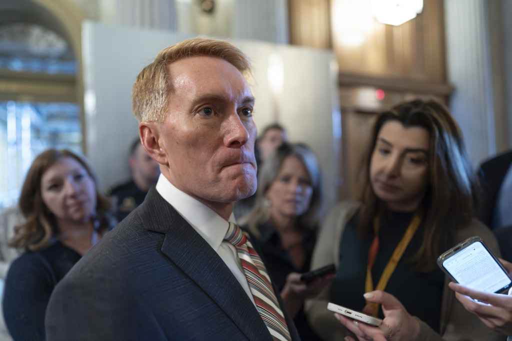 Sen. James Lankford, R-Okla., the lead GOP negotiator on a border-foreign aid package, speaks with reporters outside the chamber at the Capitol in Washington, Thursday, Jan. 25, 2024.