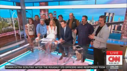 CNN This Morning crew gathers at the newsdesk