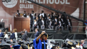 An attendee stands with their back to President Joe Biden as Biden speaks to graduating students at the Morehouse College commencement Sunday, May 19, 2024, in Atlanta.