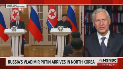 Image of Vladimir Putin and Kim Jong Un next to John Meacham