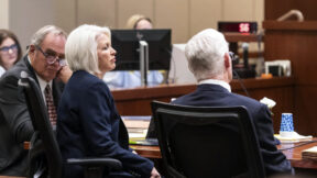Former Mesa County Clerk and Recorder Tina Peters, middle, listens to the prosecution during her sentencing for her election interference case at the Mesa County District Court Thursday, Oct. 3, 2024, in Grand Junction, Colo.