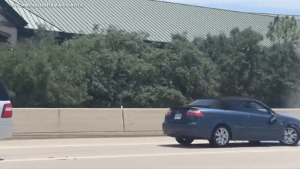 houston car being towed backwards
