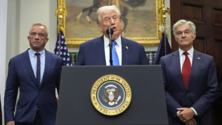President Donald Trump speaks in the Roosevelt Room of the White House, Monday, Sept. 22, 2025, in Washington, as Health and Human Services Secretary Robert F. Kennedy Jr., left, and Centers for Medicare & Medicaid Services administrator Dr. Mehmet Oz listen.