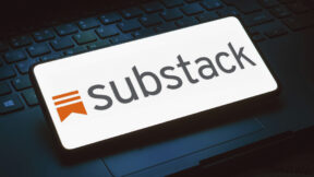 In this photo illustration, the Substack logo is displayed on a smartphone screen.