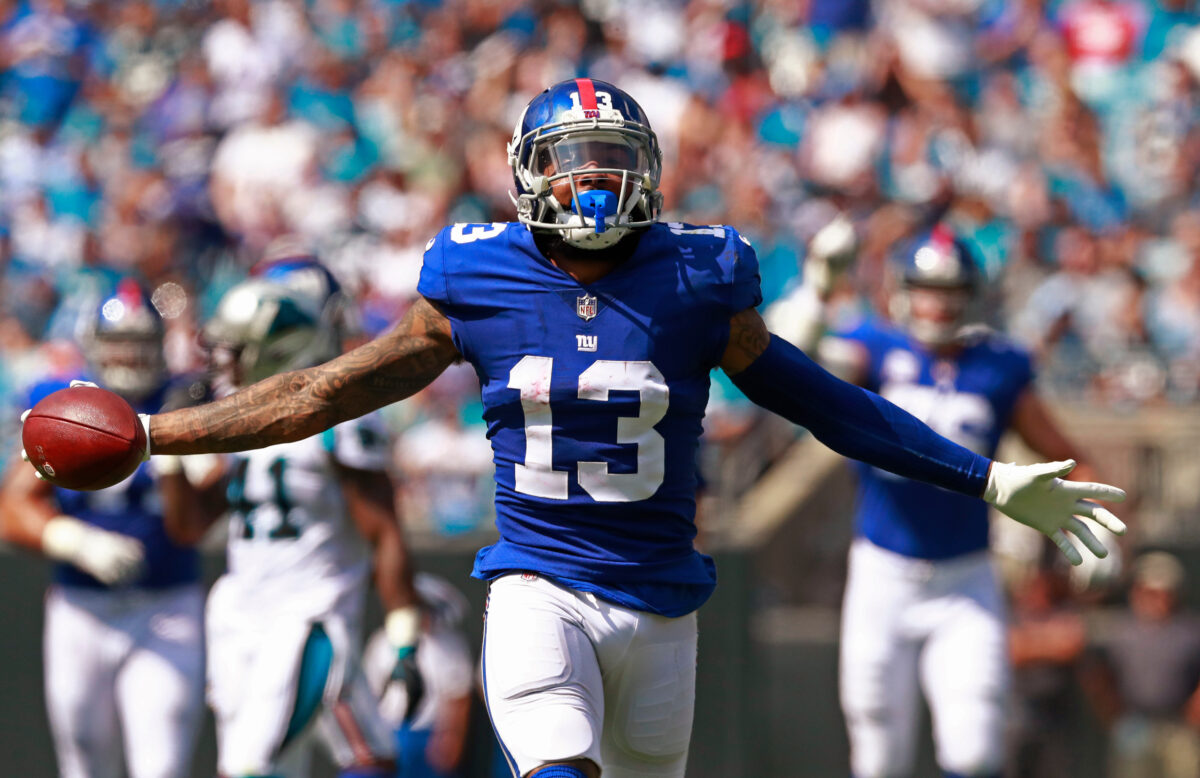 FILE - New York Giants' Odell Beckham Jr. celebrates a catch against the Carolina Panthers during the first half of an NFL football game Oct. 7, 2018, in Charlotte, N.C. (AP Photo/Jason E. Miczek, File)