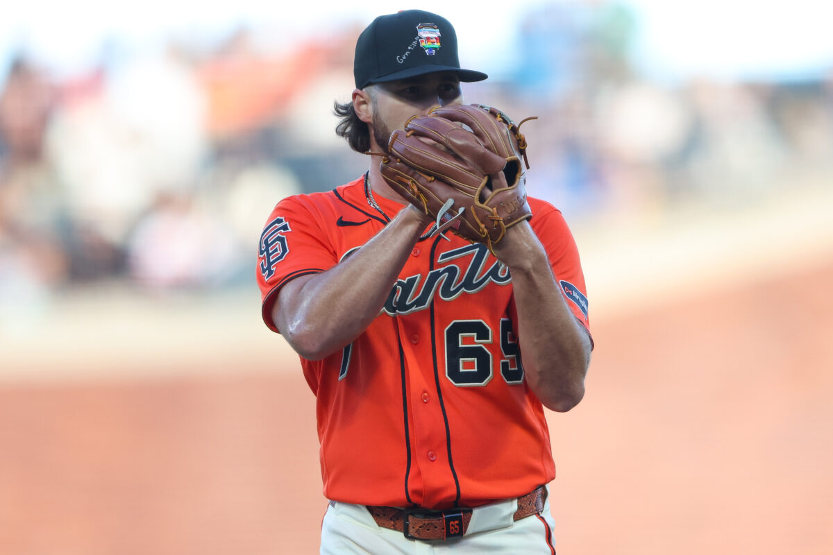 San Francisco Giants pitcher Landen Roupp waits for the sign during the first inning of a baseball game against the Chicago Cubs Friday, June 12, 2026, in San Francisco, Calif. (AP Photo/Scott Marshall)
