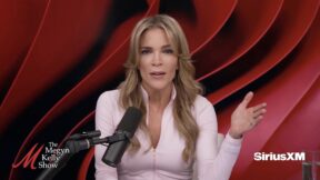 Megyn Kelly on her show speaking at a microphone