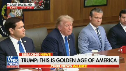 trump with rubio to his right and hegseth to his left, at a cabinet meeting at camp david