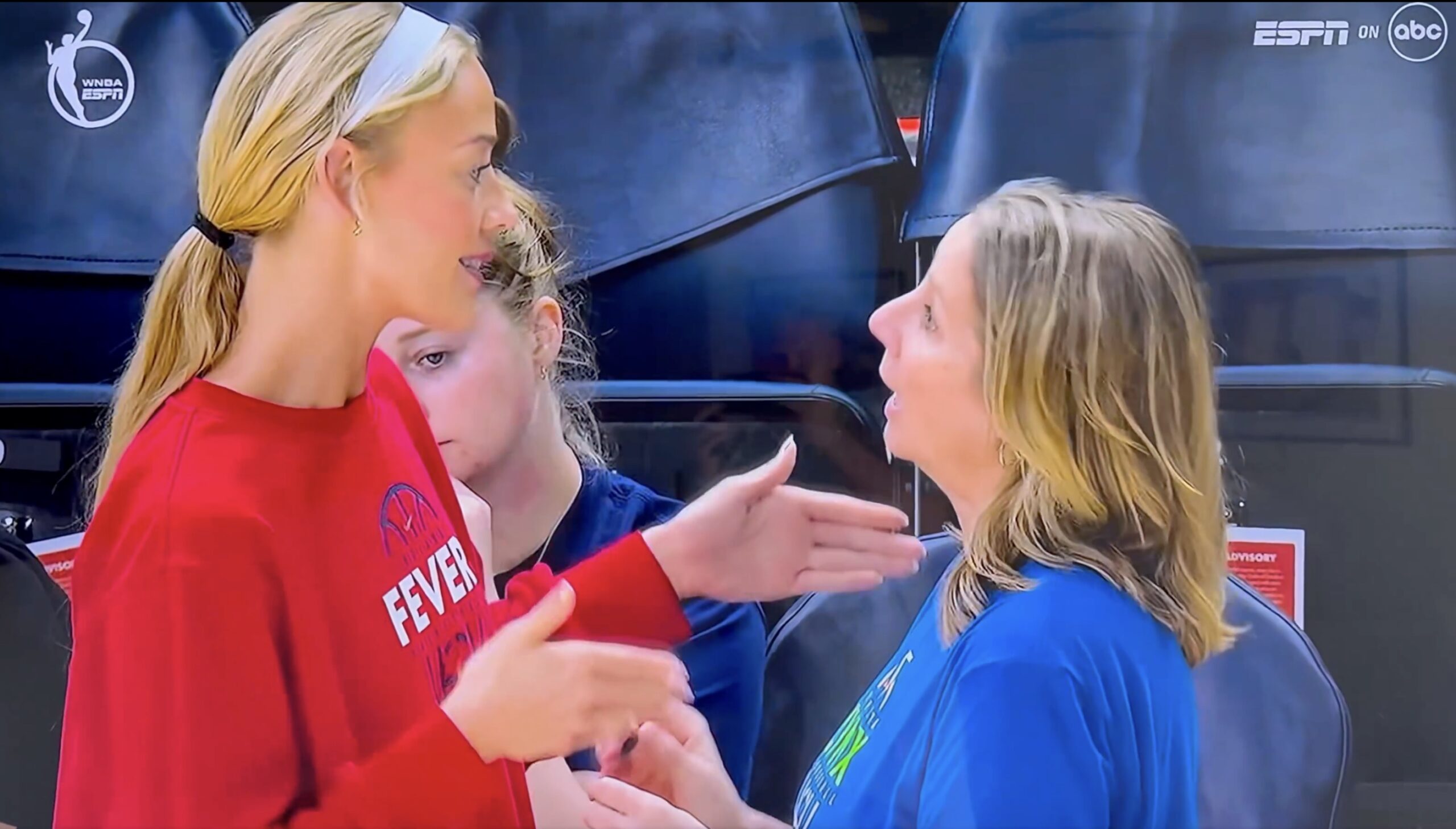 Sophie Cunningham talks to Minnesota Lynx head coach Cheryl Reeve before the game on Sunday.