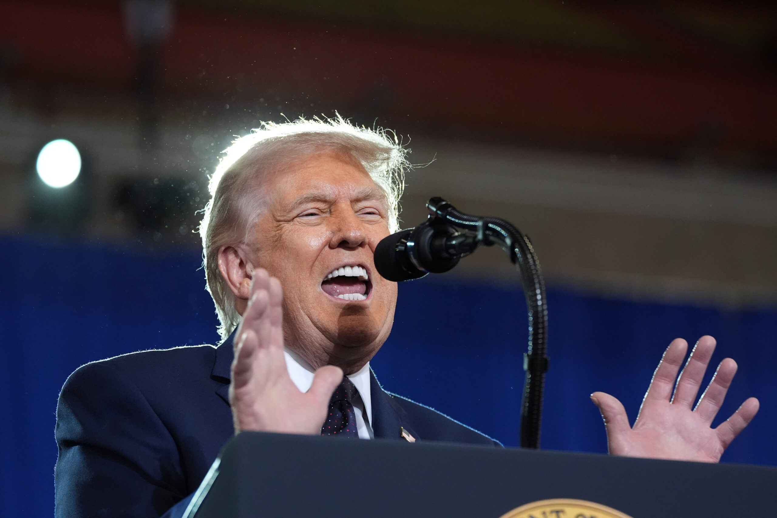 trump on the microphone